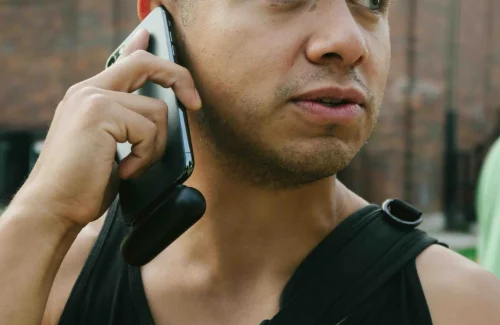 Man Answering a Phone